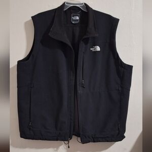 The North Face Black Vest with Stand-Up Collar and Zip-Up Style
